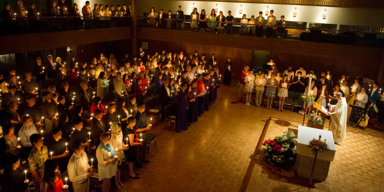 Congregation in the Chapel of Christ the Teacher in candlelight