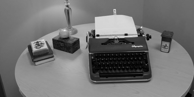Image of desk and typewriter