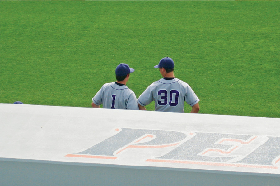 Gus Little and Travis Vetters in baseball uniforms