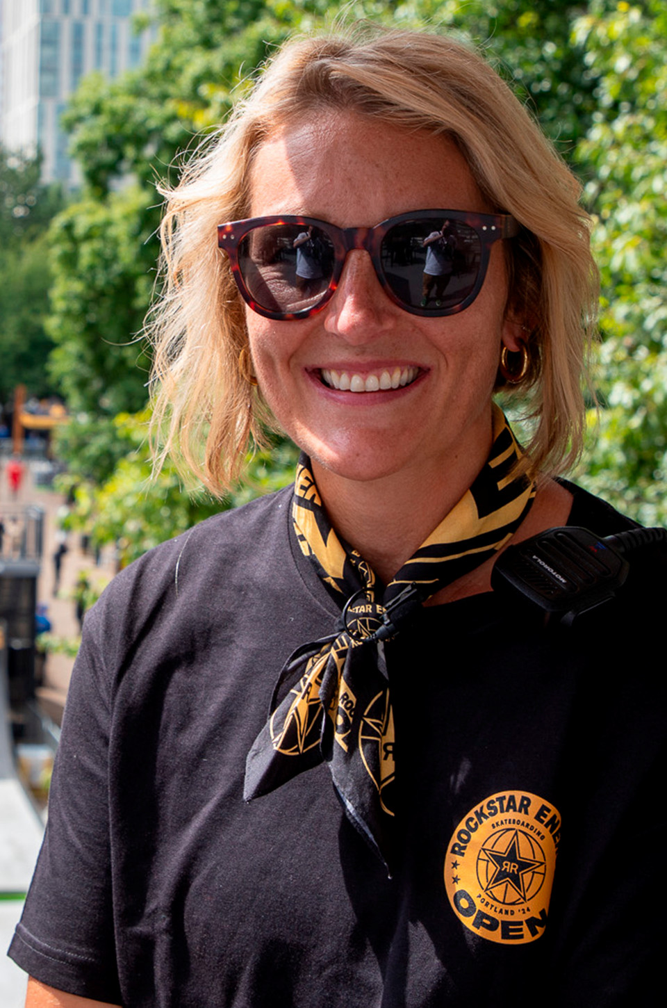 UP alum Christina Fuller smiles for a portrait on a sunny day in downtown Portland.