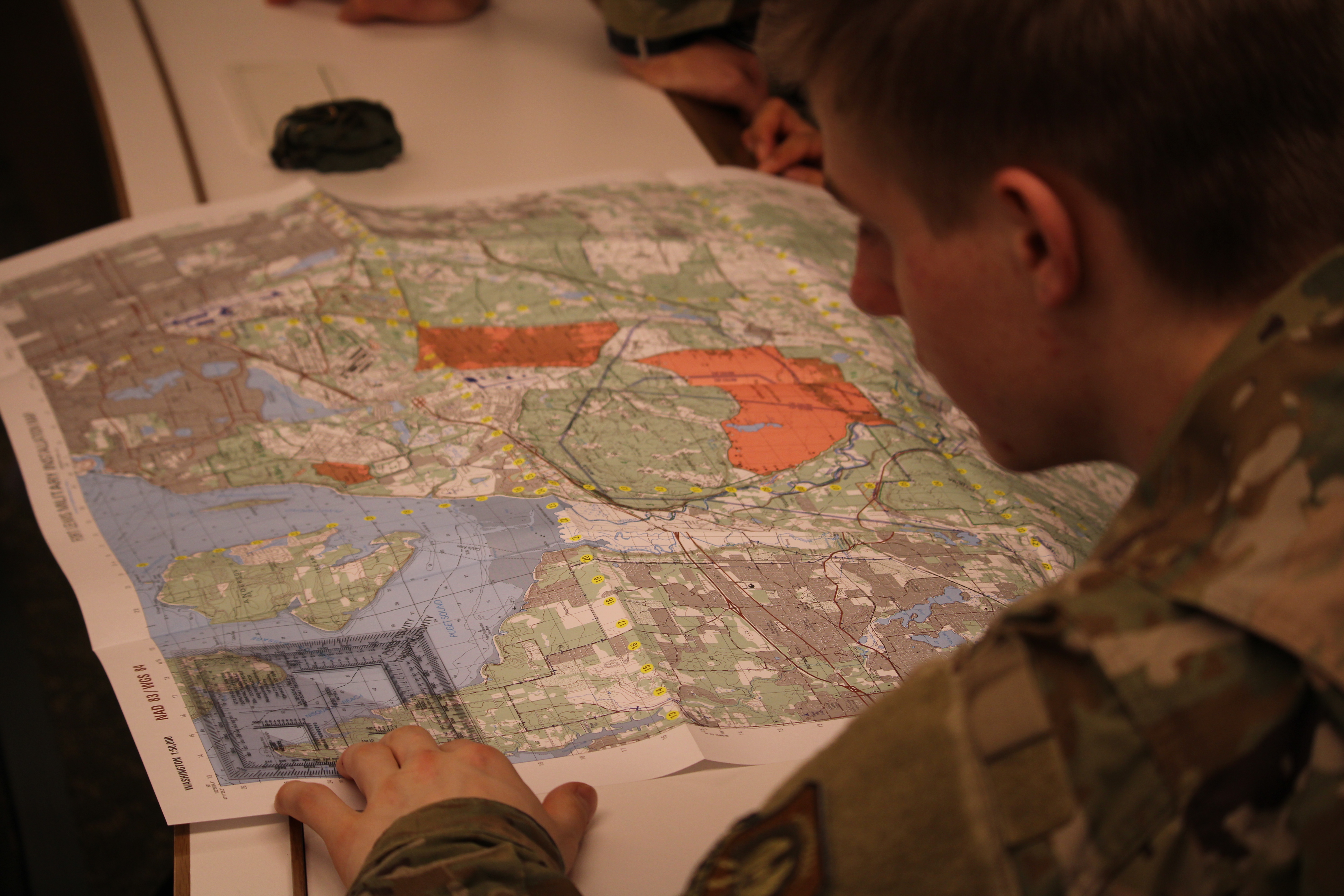 AFROTC student viewing a map.
