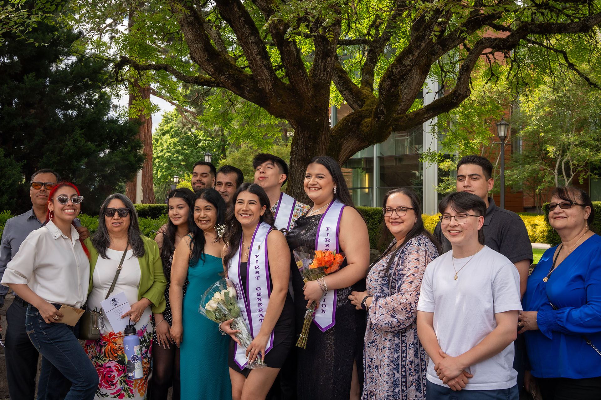 FGEN students and large family pose for group photo.