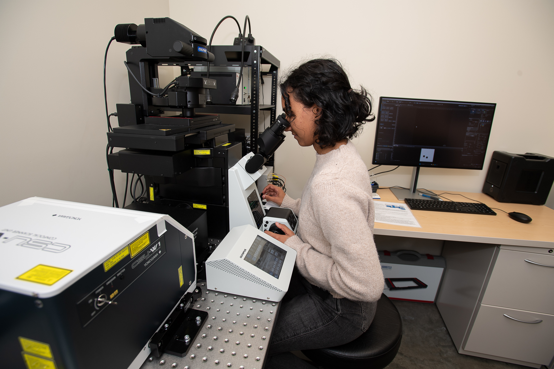 Student using the Biology facilities' microscope