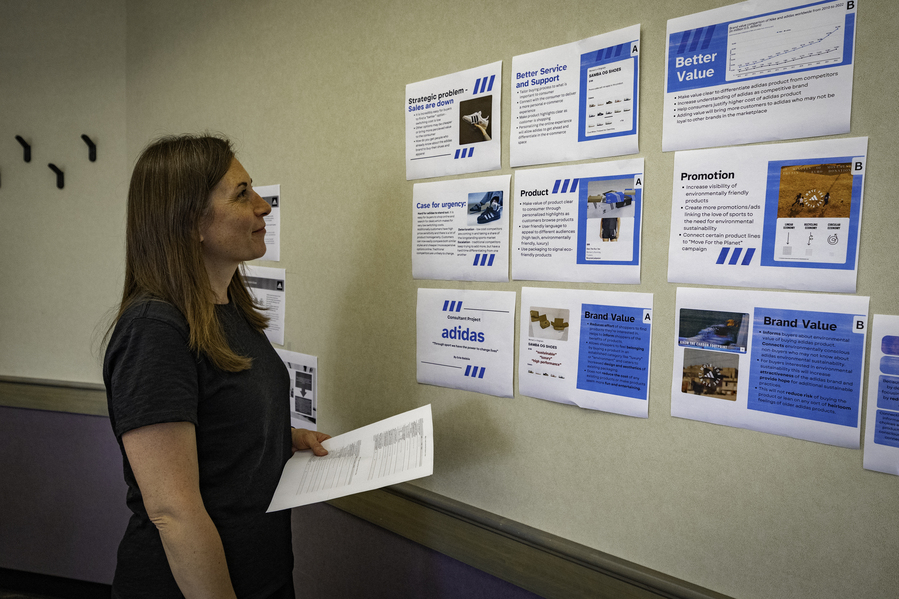A UP student reviews a marketing strategy deck layout