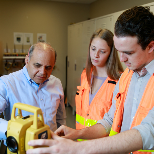 UP Civil Engineering students working closely with a professor.