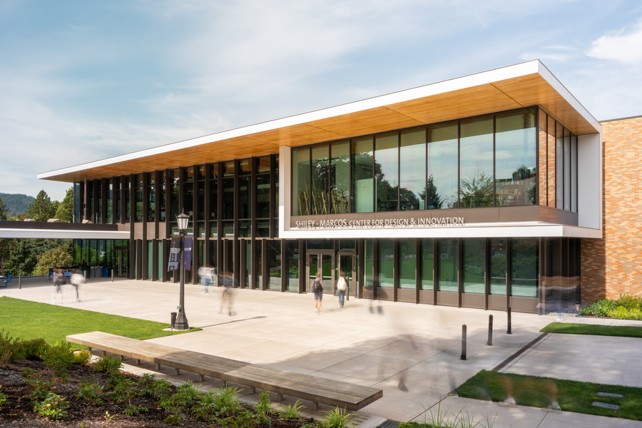 The exterior of the Shiley-Marcos Center for Design & Innovation, a contemporary Leed certified building with windows extending across the entire facade.