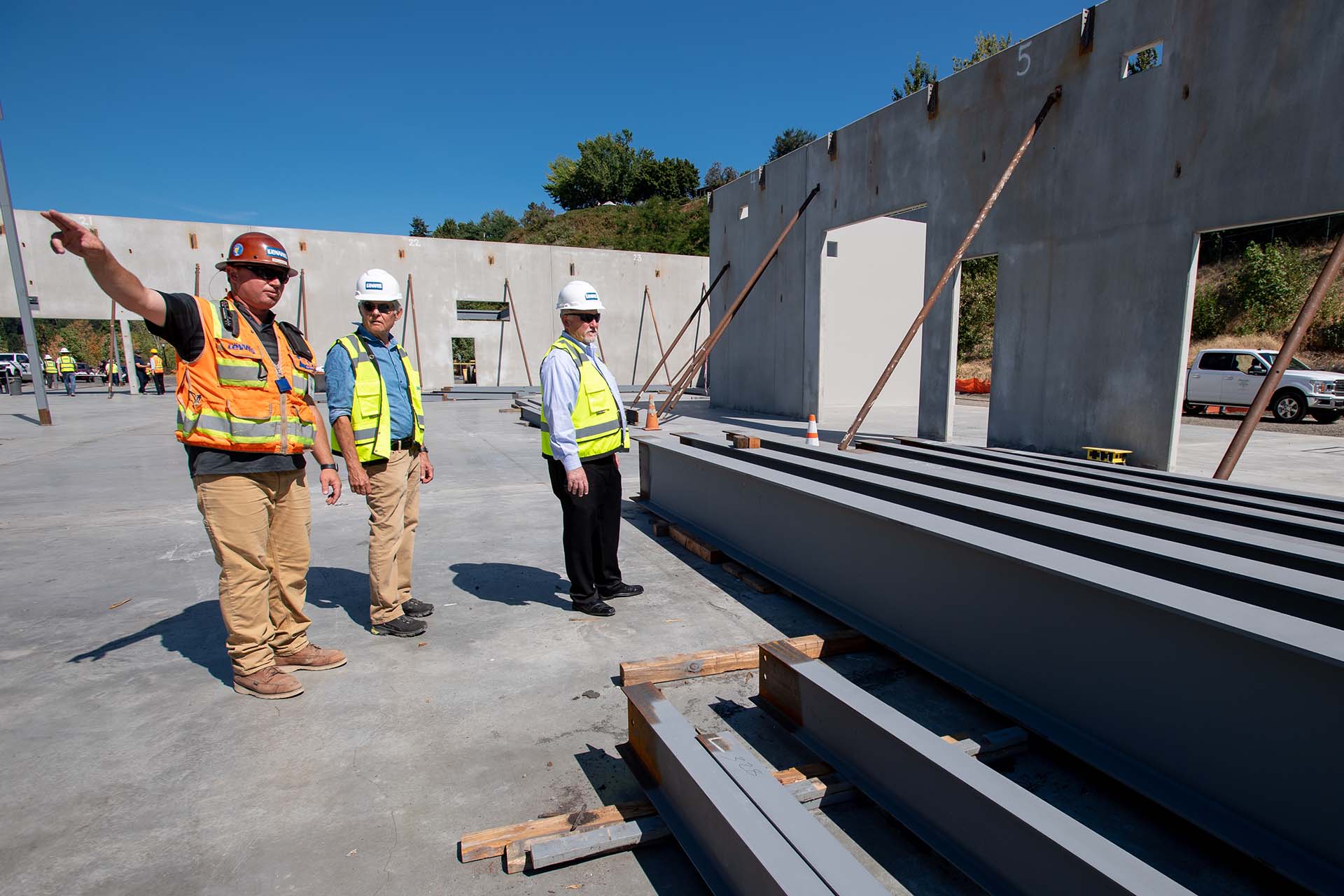 Workers overseeing the construction of the Physical Plant building on the River Campus of University of Portland.