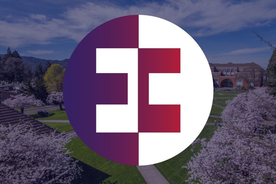 The logo of the Entrepreneurship Club at the University of Portland with an image of the campus in the background.