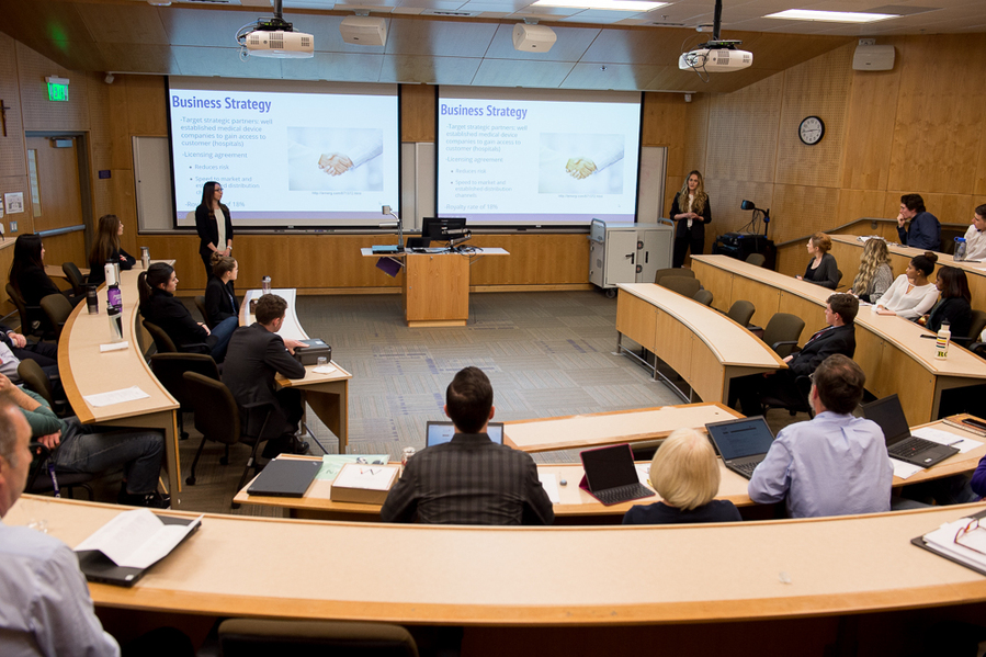 Two students present their classwork in an operation technology classroom at the University of Portland.