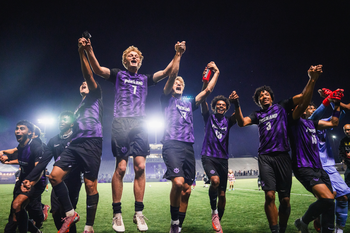 Soccer team celebrates a victory