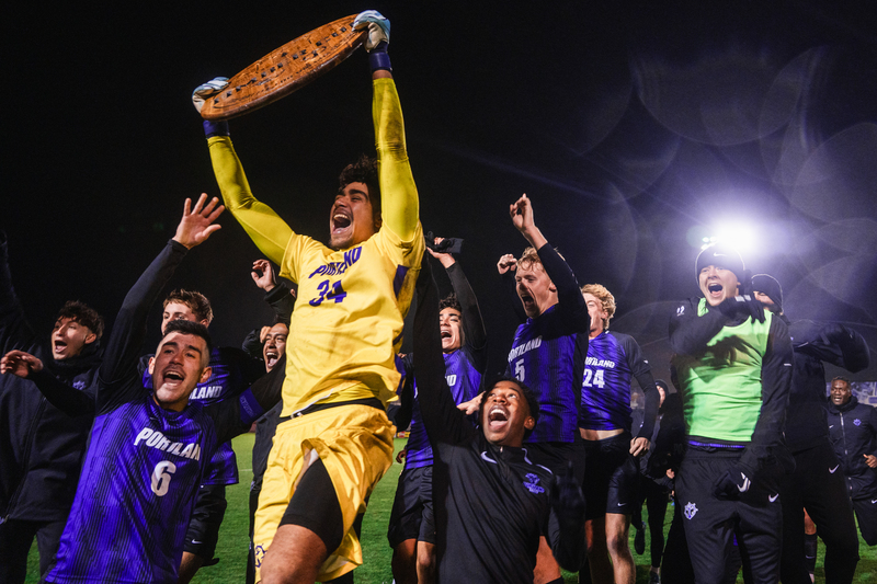 Men's soccer team celebrates win