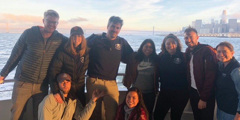 Bay Area Alumni with the San Francisco skyline in the background.