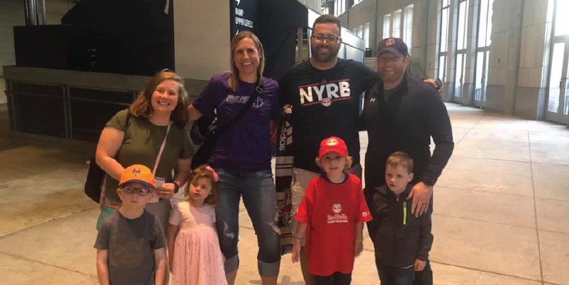 Two families and their kids at a Red Bulls game.