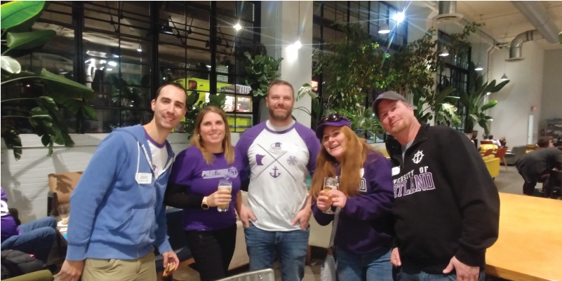 Five alumni at Backstack Brewery.