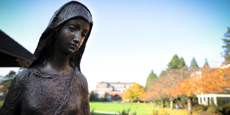 Statue of Mary in shadow