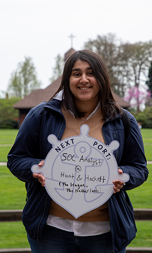 Hera Malik holding First Port sign