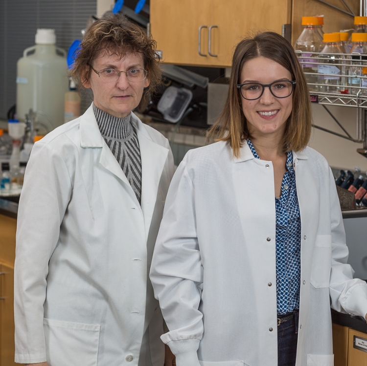 Dr. Ahern-Rindell and student Alex Quackenbush in lab.