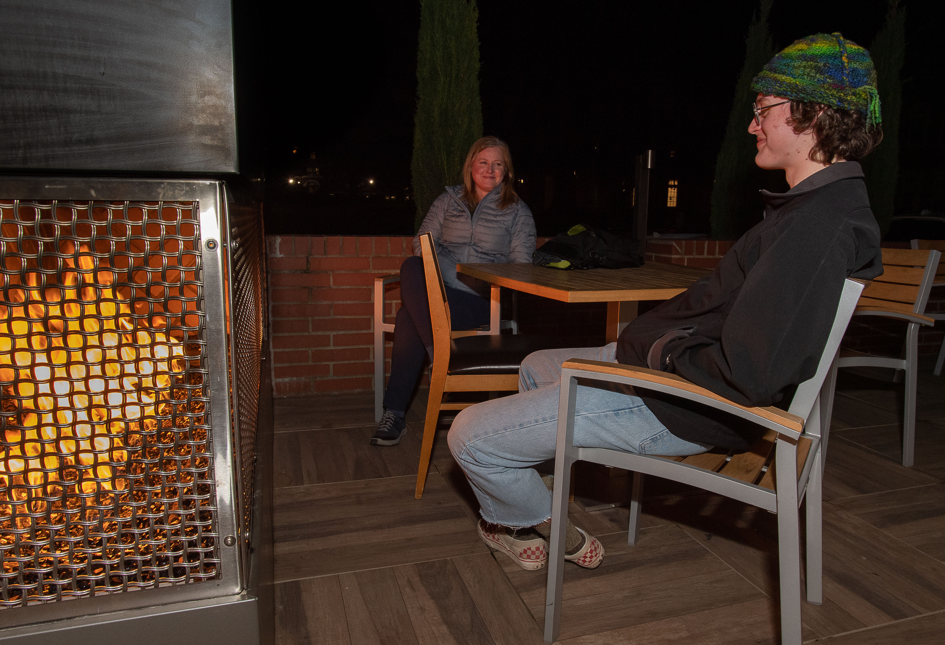 Mother son at fire pit