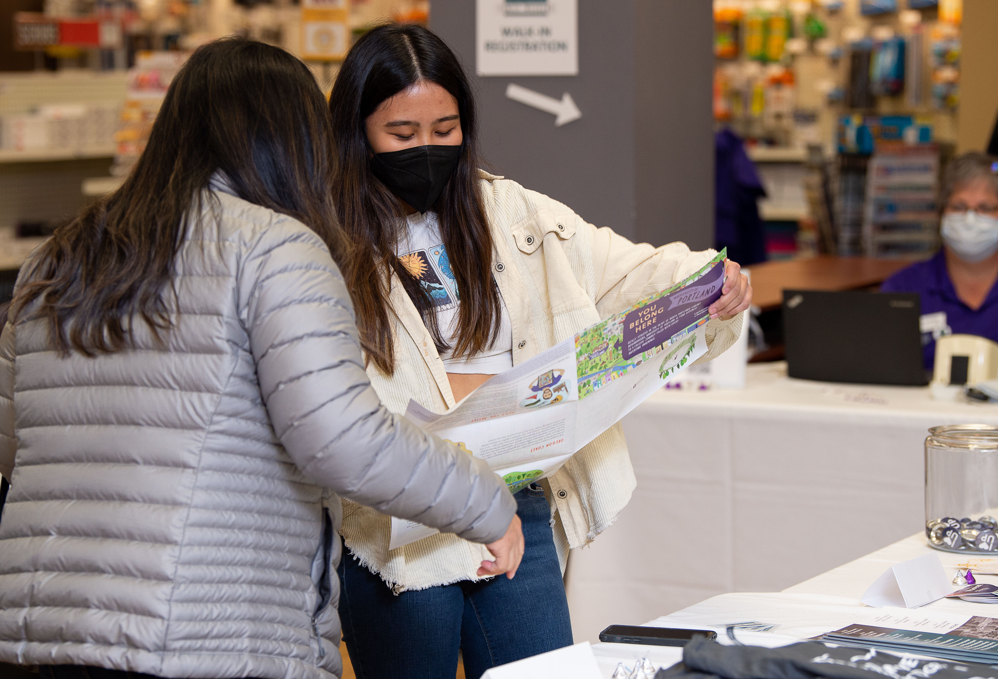 Two students looking at map