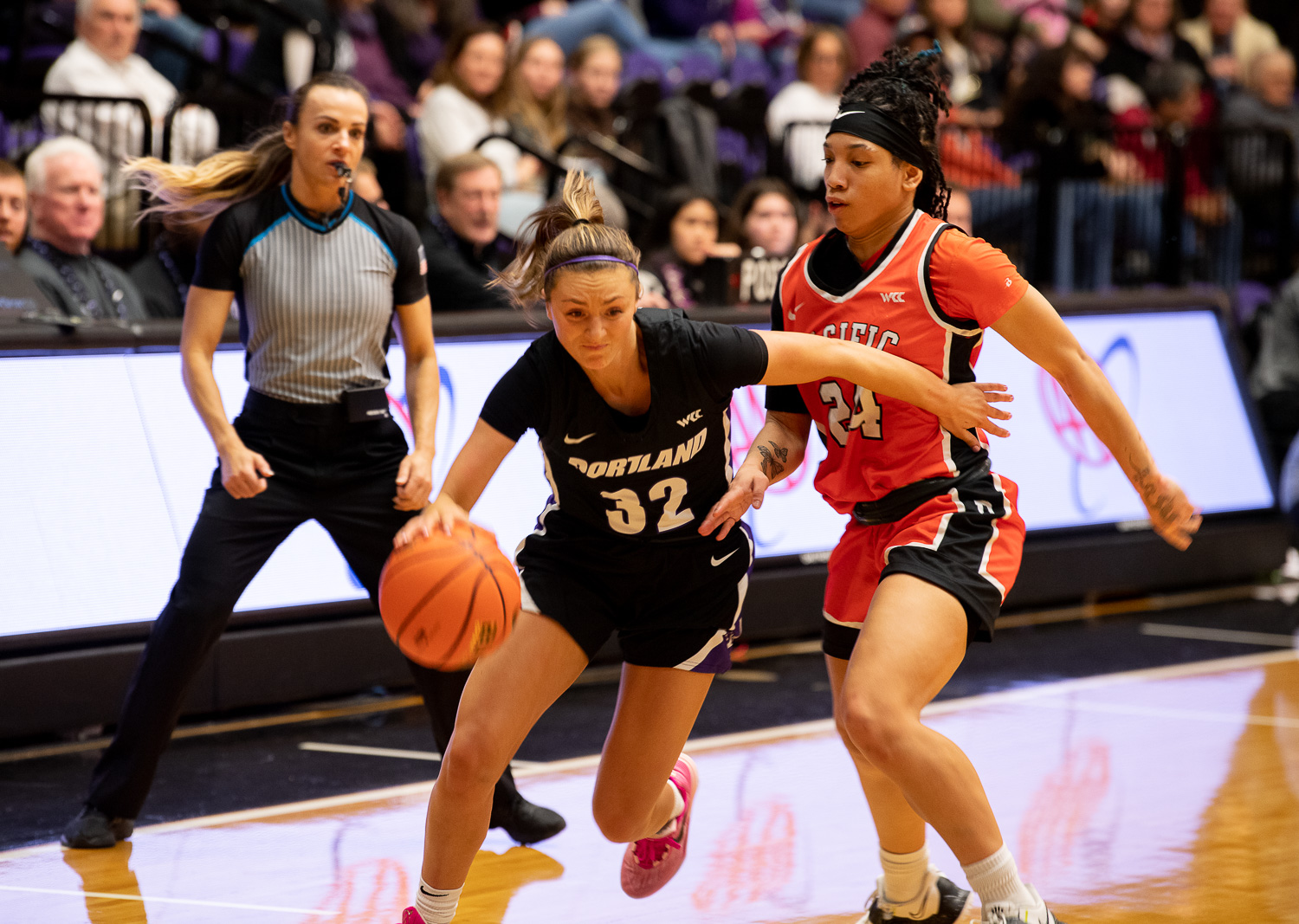 Women's basketball game action shot