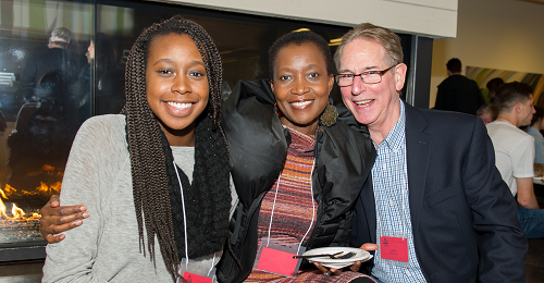 Smiling family at Junior Parents Weekend