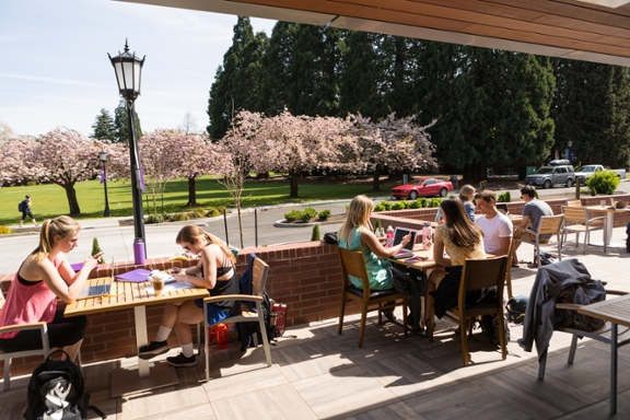 students on pilot house patio