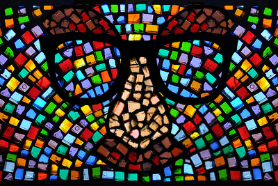 Beckman Humor stained glass logo