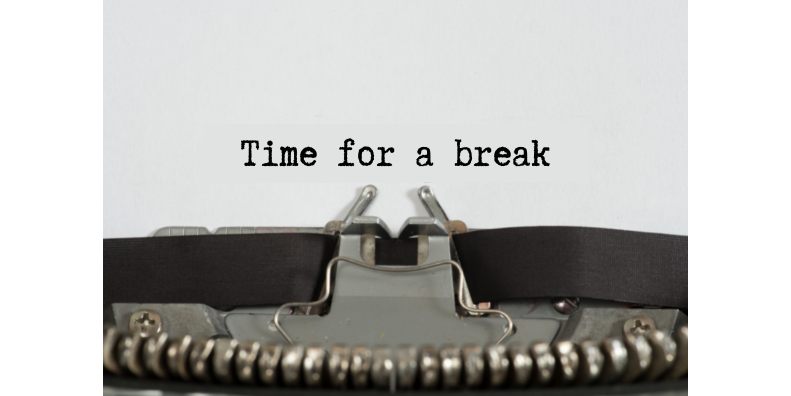 typewriter with time for a break typed on it