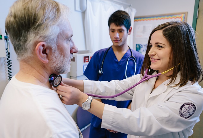 Nurse using scope 