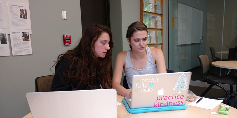 Image of writing assistant helping a student