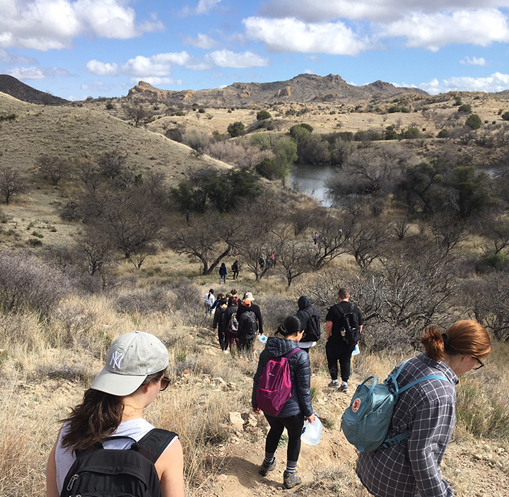 2020 Border Immersion - students walk in desert