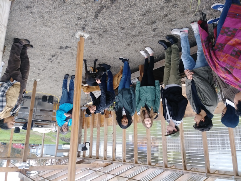 Students on the North Portland Immersion, in a greenhouse at a local farm