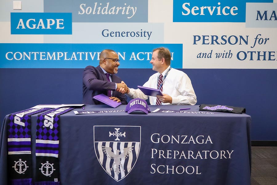 University of Portland President Robert Kelly and Gonzaga Prep President Michael Dougherty signed a Moreau Pathway agreement on November 14.