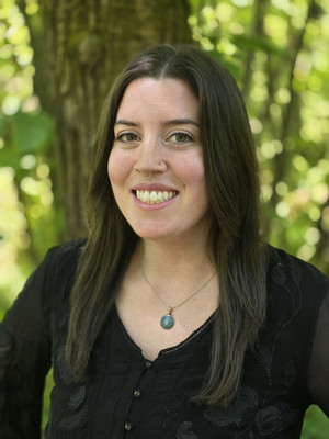 new faculty sarah smiling