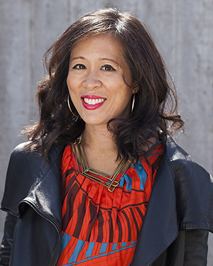 Lisa Ko in front of backdrop