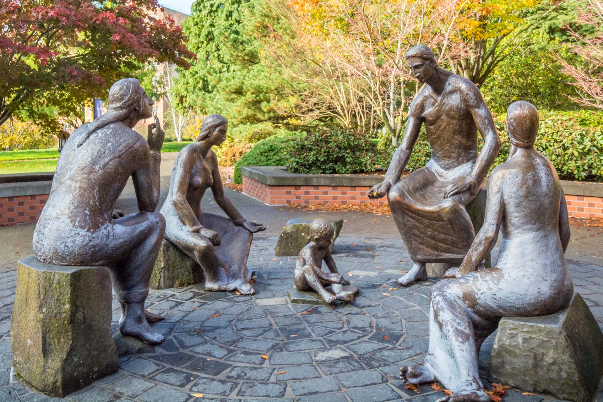 The bronze sculptural group entitled Christ the Teacher