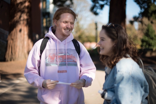 girl and boy laughing