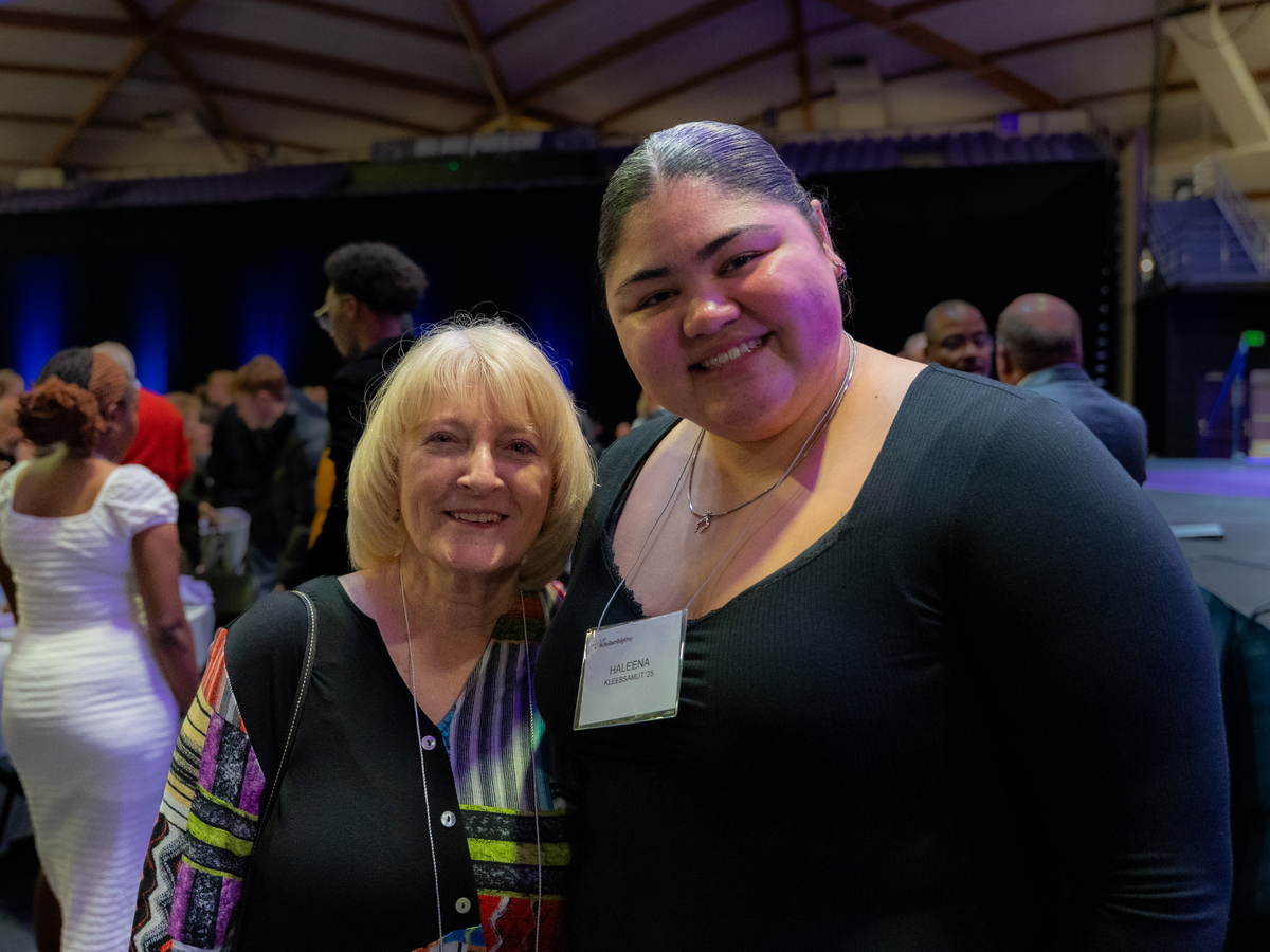 A student scholarship recipient and their benefactor pose for a photograph at the Scholarship Day Luncheon.