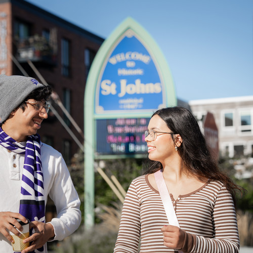 Students walk to the grocery store in the St Johns neighborhood