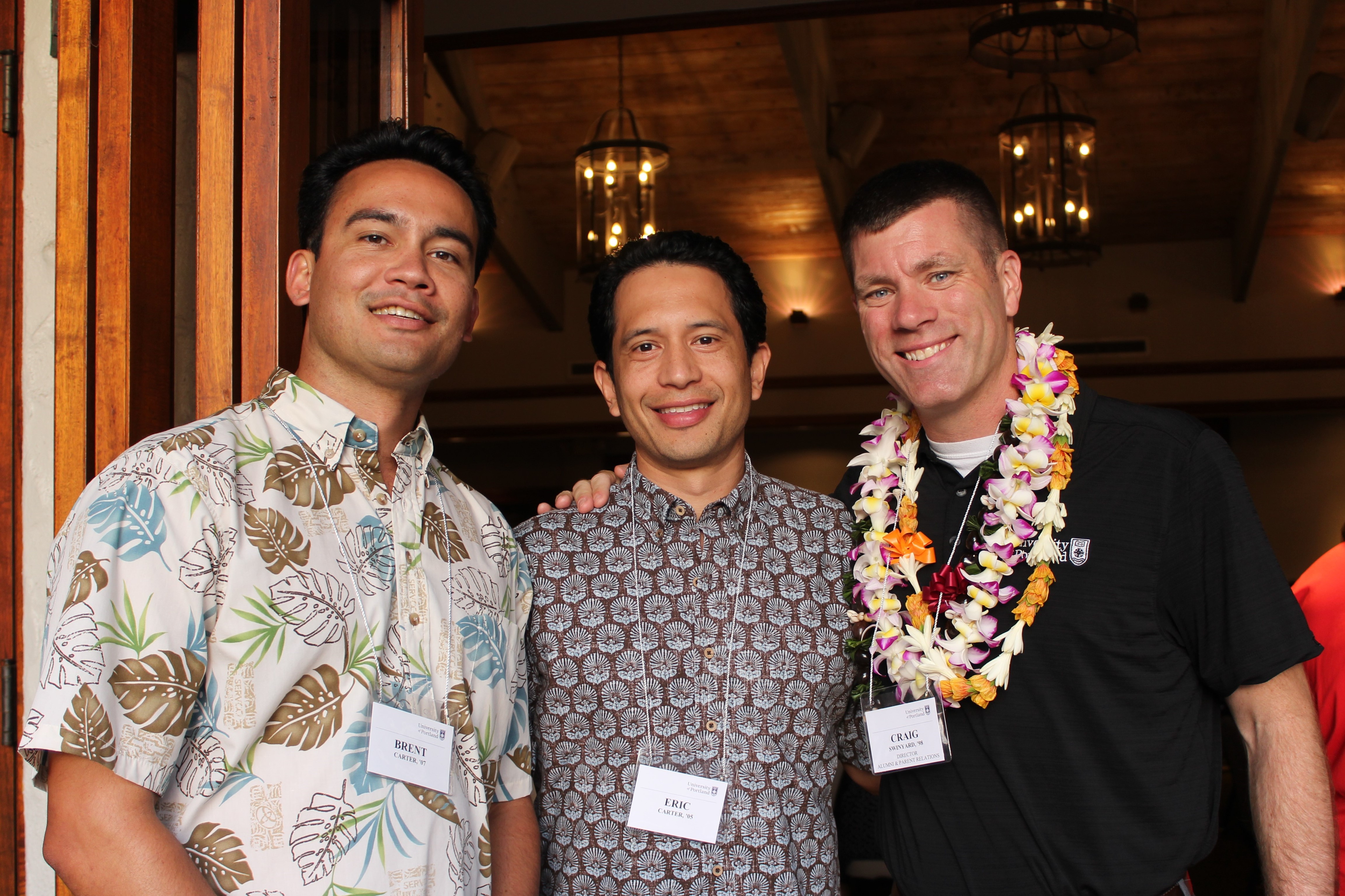 Group posing for photo at Hawai'i University Reception