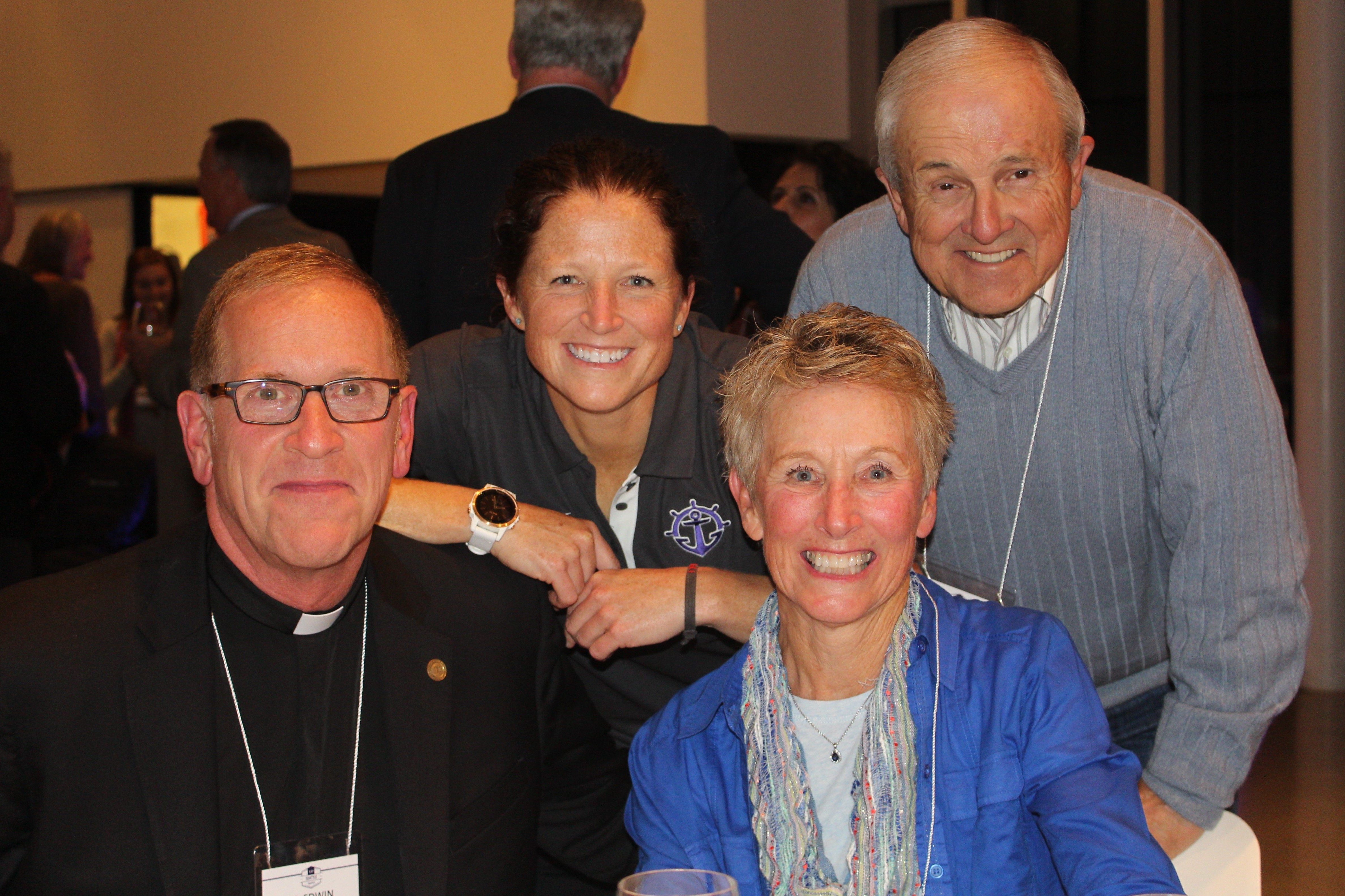 Group posing for photo at Seattle University Reception