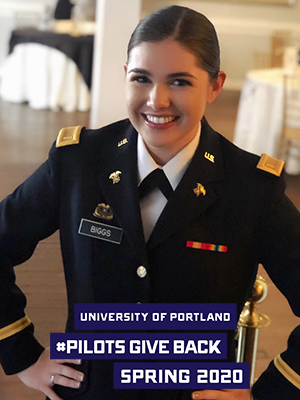 Beth Biggs in National Guard uniform with logo that reads "University of Portland Pilots Give Back Spring 2020"