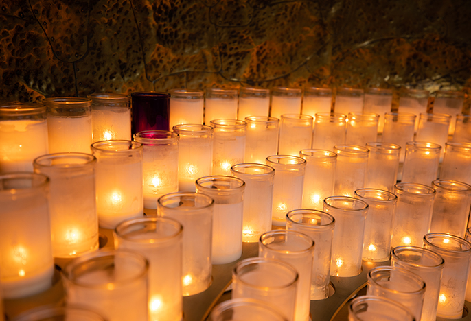 candles lit in the grotto
