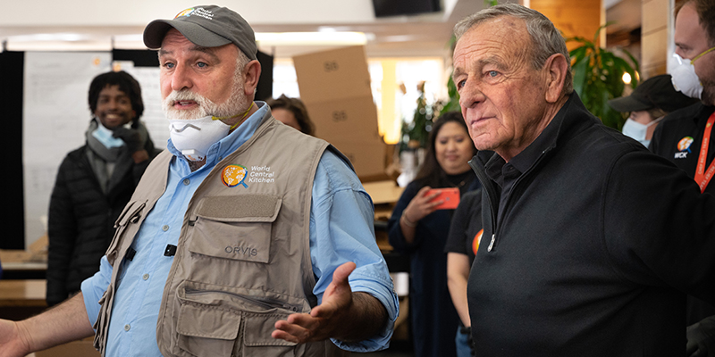 Fedele Bauccio and José André addressing group of people