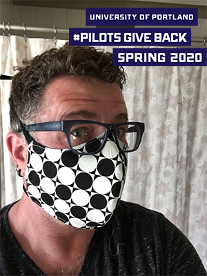 Gregory Pulver in mask with logo that reads University of Portland Pilots Give Back Spring 2020