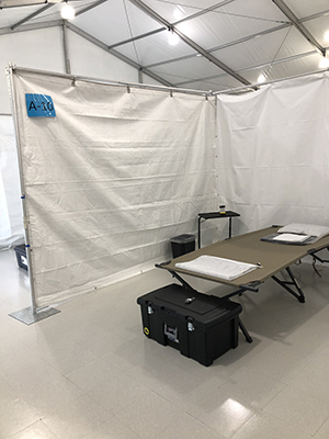 hospital bed and supplies in tent in King County, WA 