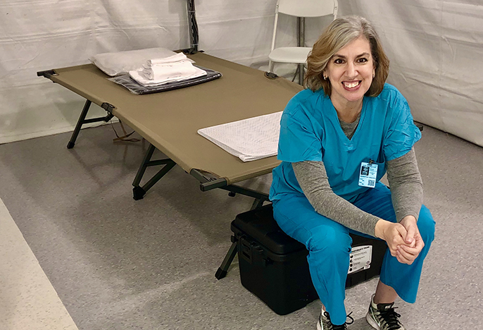 Jennifer Graves in nursing scrubs