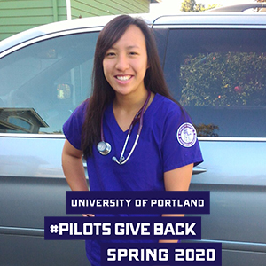 Kimberly Tran in nursing scrubs with logo that reads University of Portland Pilots Give Back Spring 2020