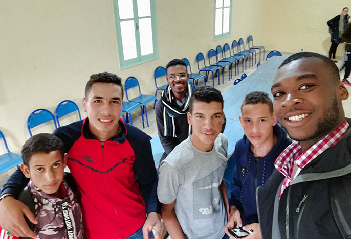 Kene Anigbogu and friends from Morrocco smiling