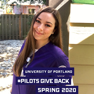 Sydney de Polo in nursing scrubs with logo that reads University of Portland Pilots Give Back Spring 2020